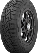 A black off-road tire mounted on a black multi-spoke wheel, shown against a plain white background. The tire sidewall features the text 'COOL COUNTRY' and 'ZOOM ZR'.