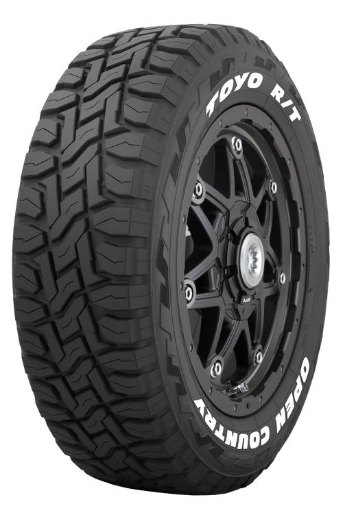 A black Toyo R/T Open Country all-terrain tire mounted on a black multi-spoke wheel, shown from a three-quarters angle on a white background.