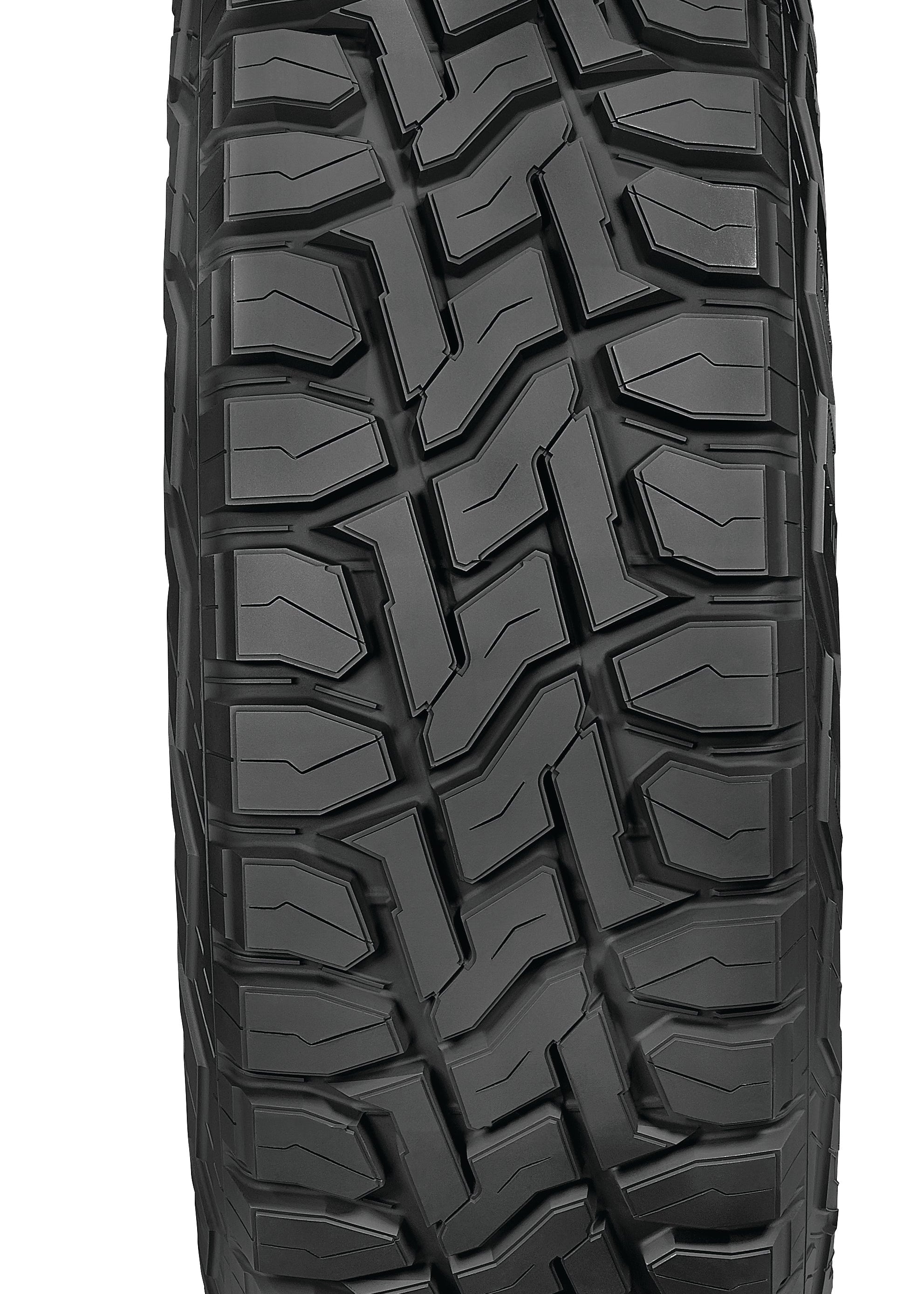 A single black all-terrain tire with a deep, aggressive tread pattern, shown from a front-facing perspective on a solid white background.